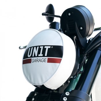 Headlamp cover in leather with logo